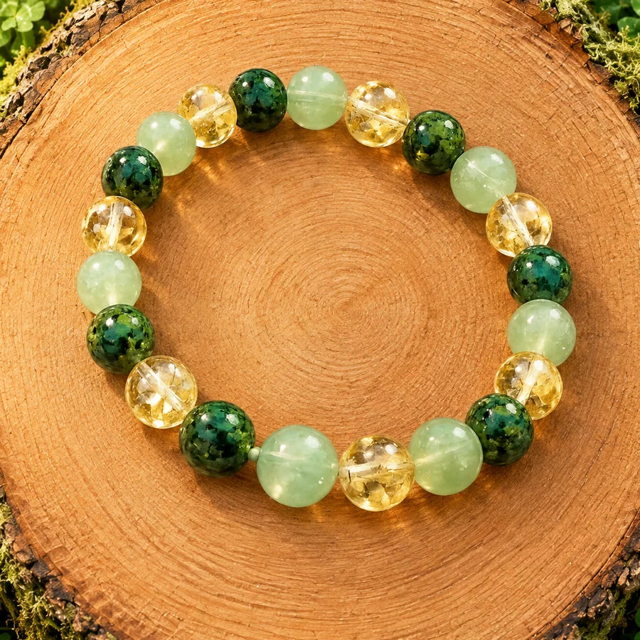 Detail of the Abundance Bracelet with green and golden beads