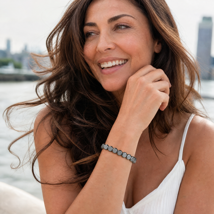 HEMATIX community - woman laughing outdoors wearing the bracelet