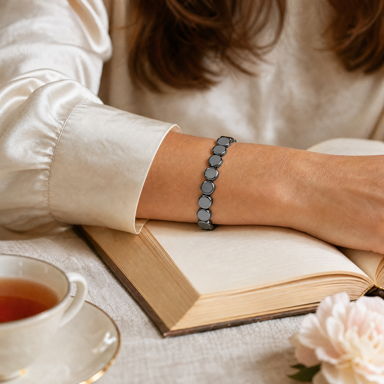 Wrist resting on an open book