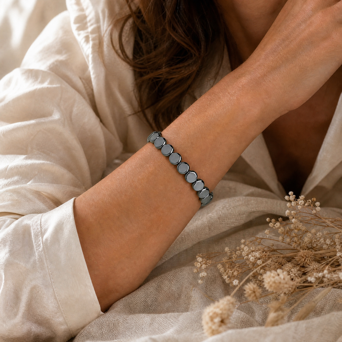 HEMATIX bracelet wrist detail on cream linen