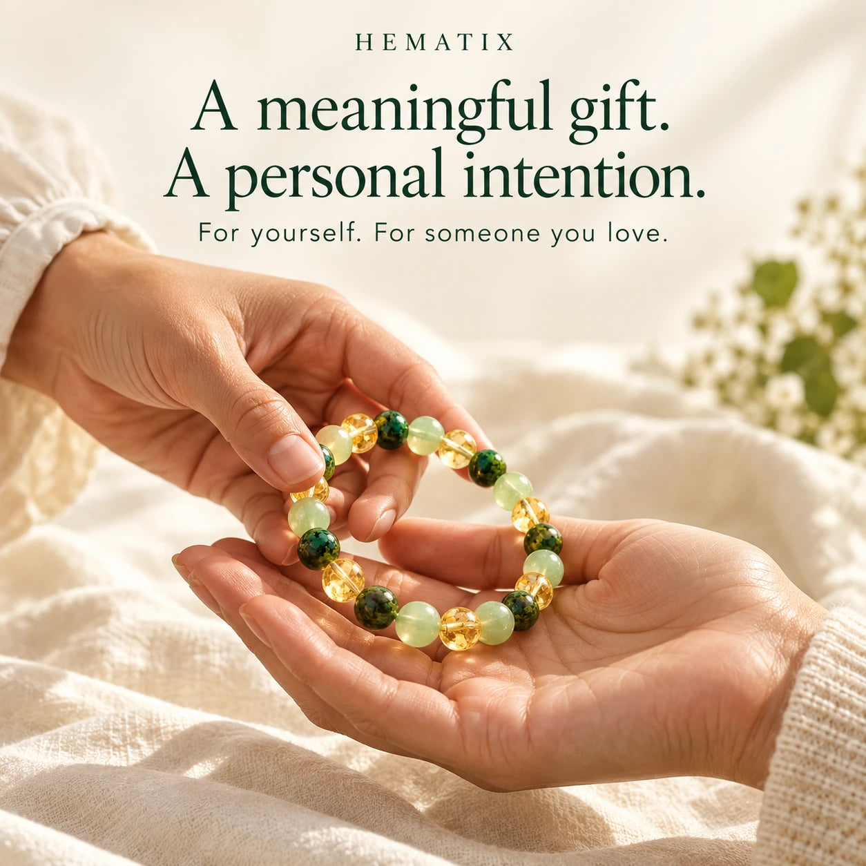 Two women sharing an Abundance bracelet as a thoughtful gift